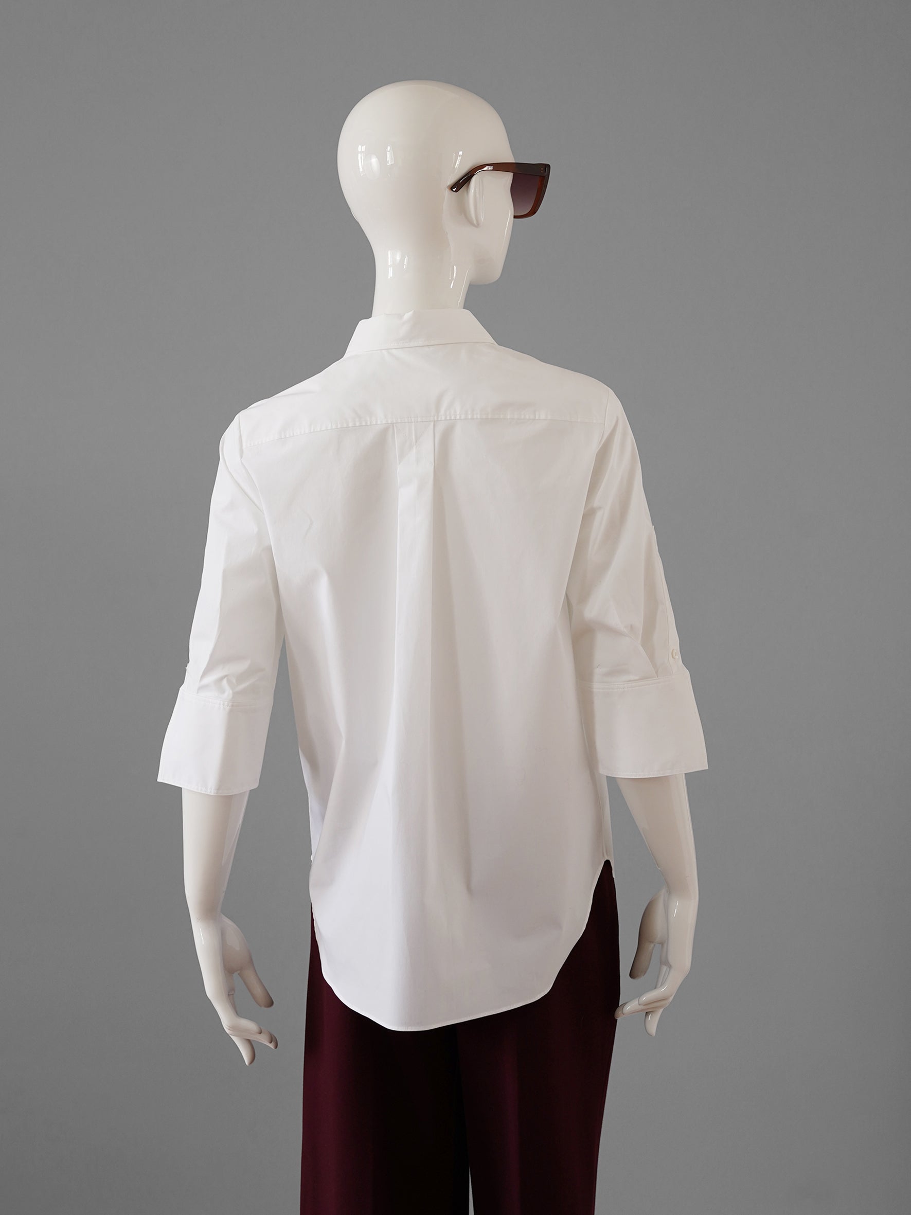 Weiße Cotton-Bluse mit verkürzten Arm